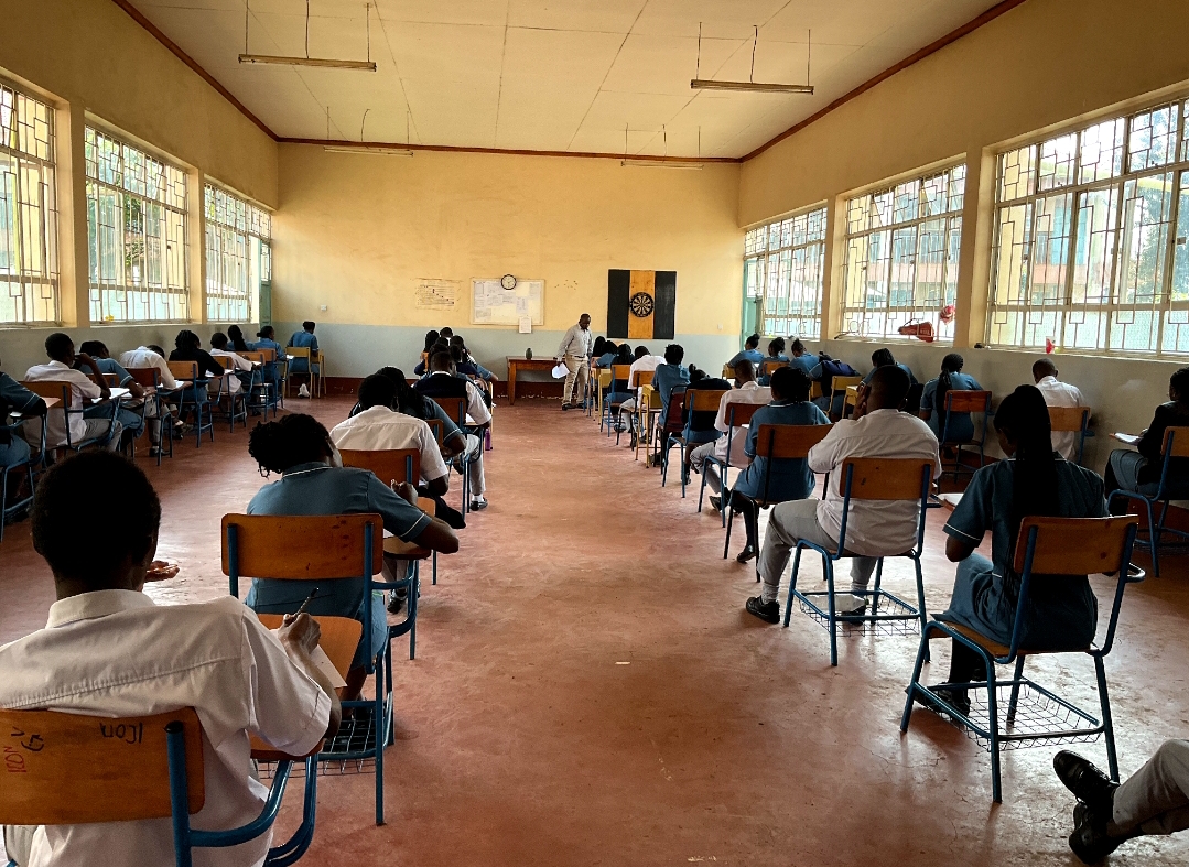 Students sitting an examination in a college lecture hall