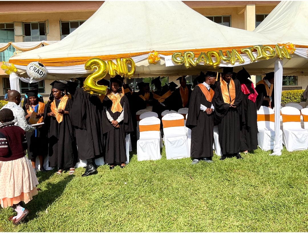 Graduands gathered under the 2nd Graduation marquee